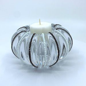 Small round glass tea candle holder 13 1/2 in. circum. 5 1/2 in. W, H 2 in.